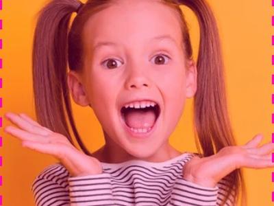 Young girl grinning with excitement